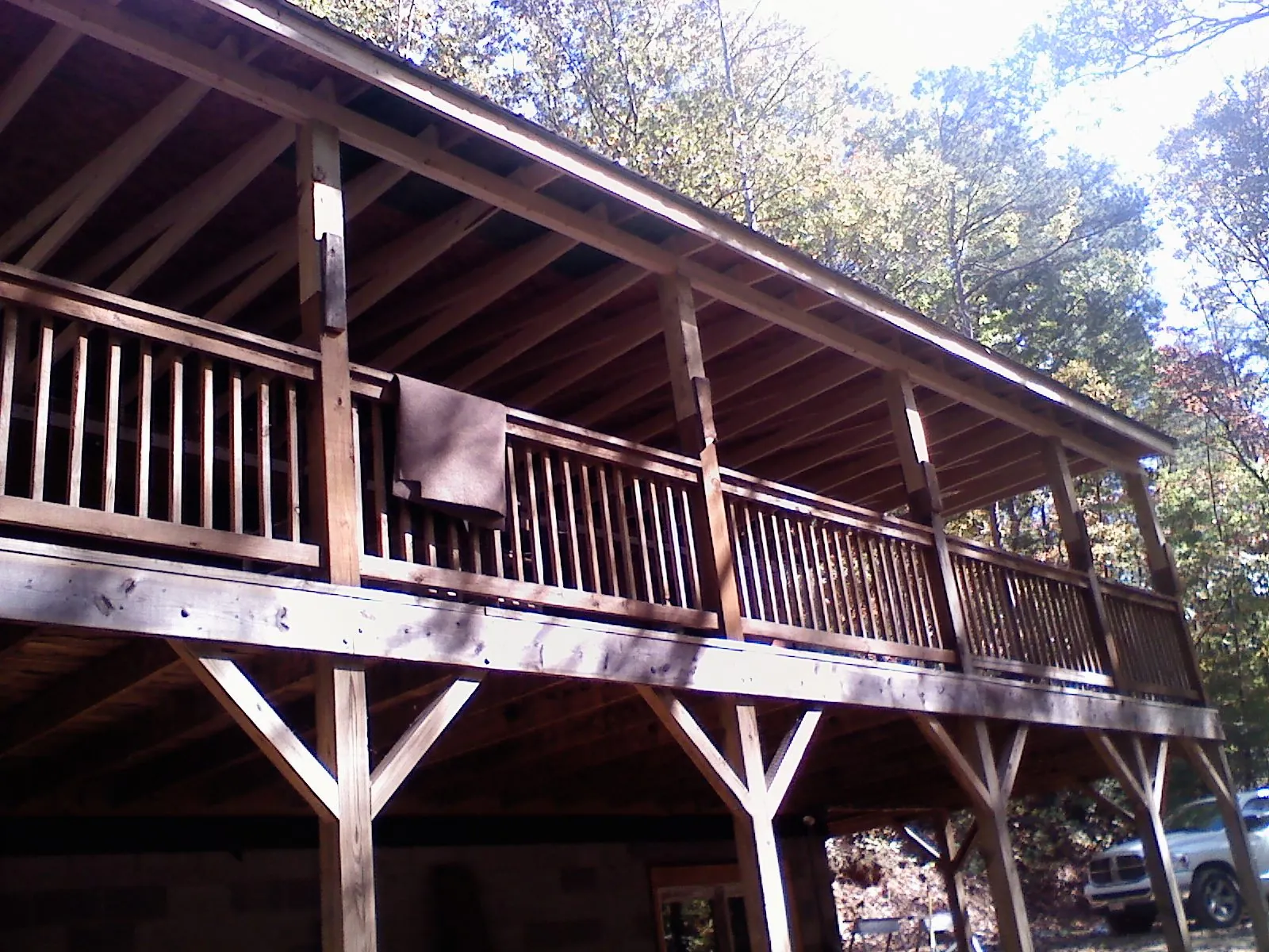 Timber framing under a new elevated porch and deck — Roof Leak Repair in Summit Point by Roofing Brothers